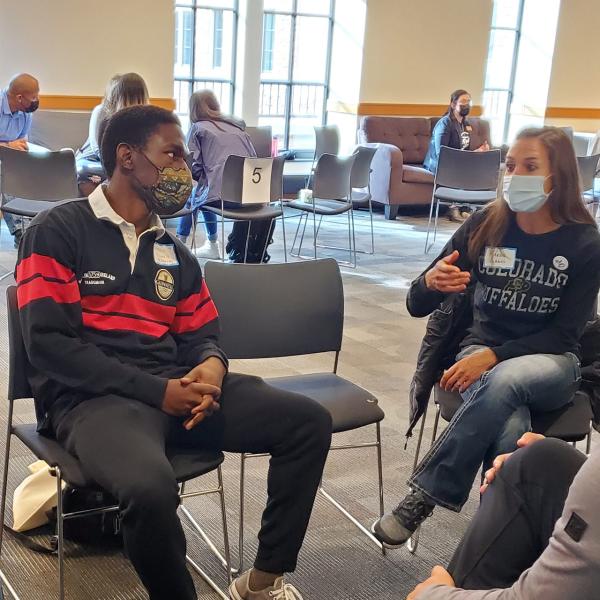 first-gen students and staff discuss their experiences on campus during an ice cream social