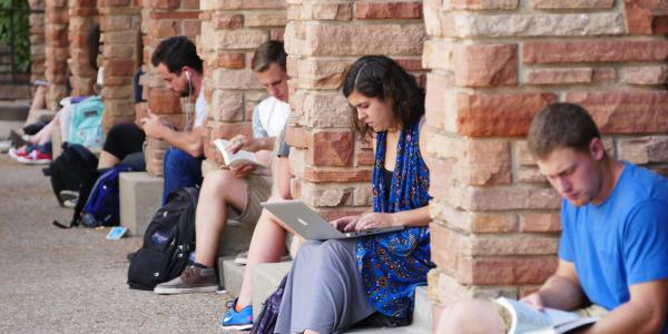 Students studying outside the UMC building